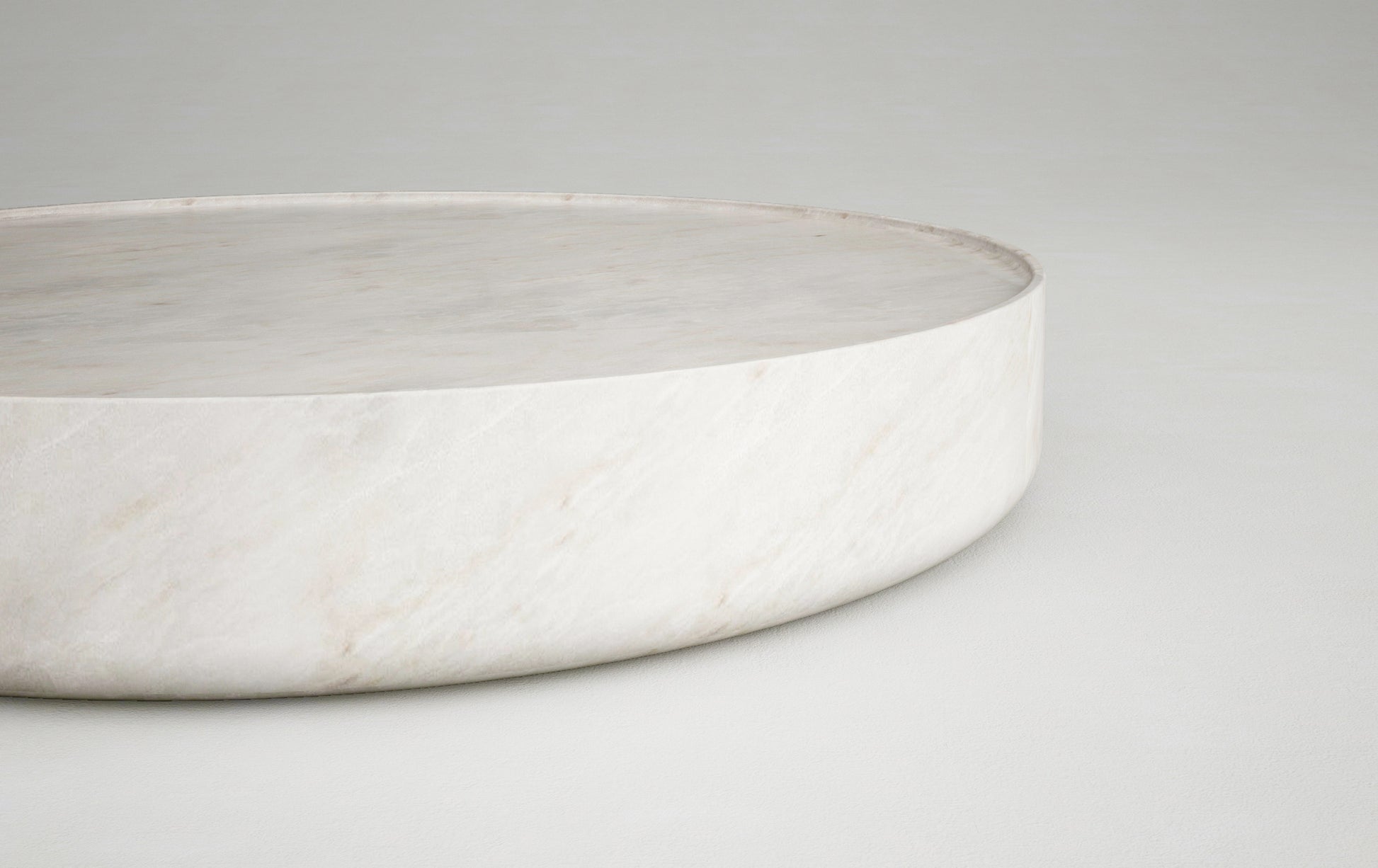 Vicenza round travertine coffee table edge detail natural stone surface Eden Stone Designs