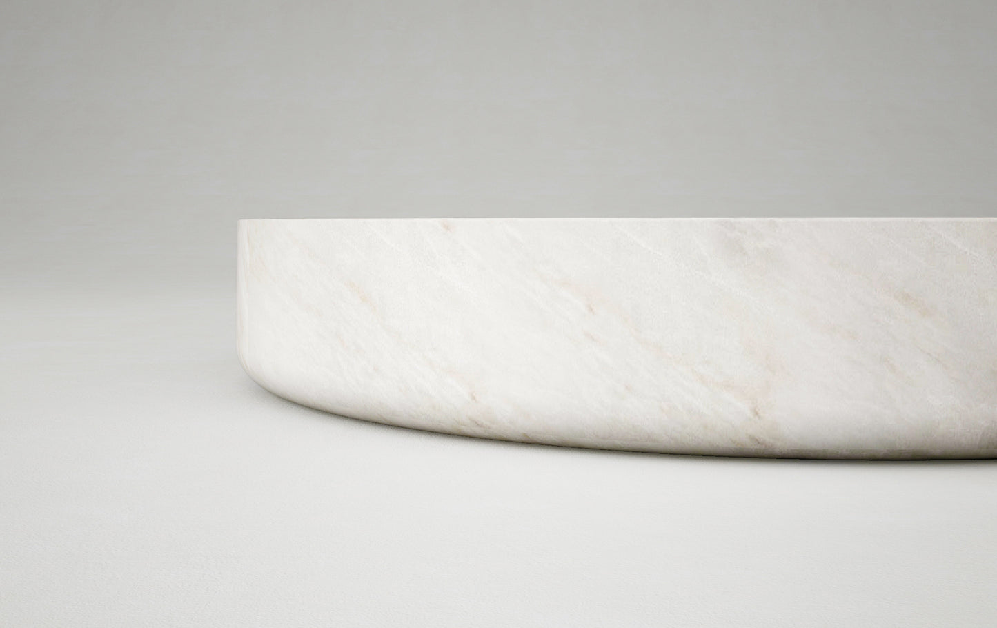 Vicenza round travertine coffee table sculptural edge natural stone Eden Stone Designs