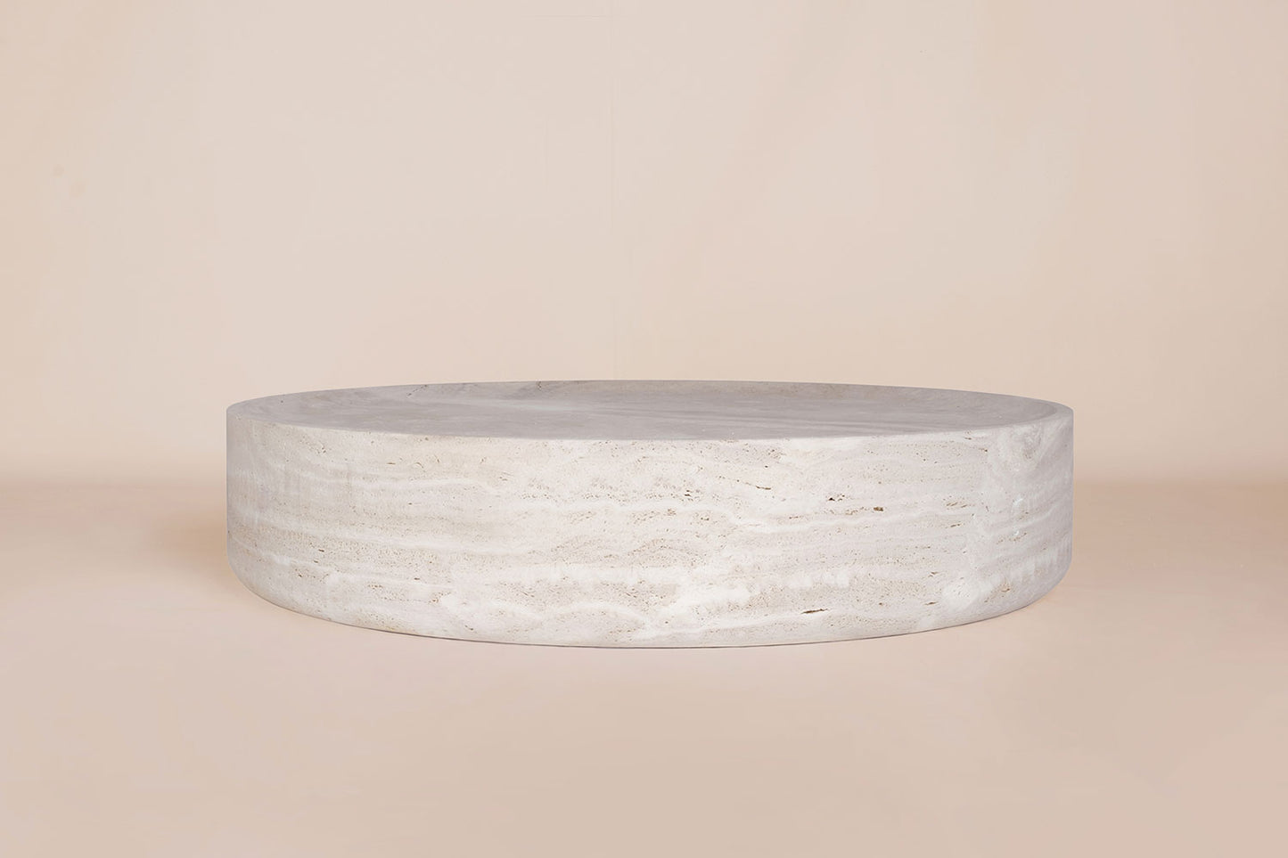 Vicenza round travertine coffee table sculptural natural stone design Eden Stone Designs