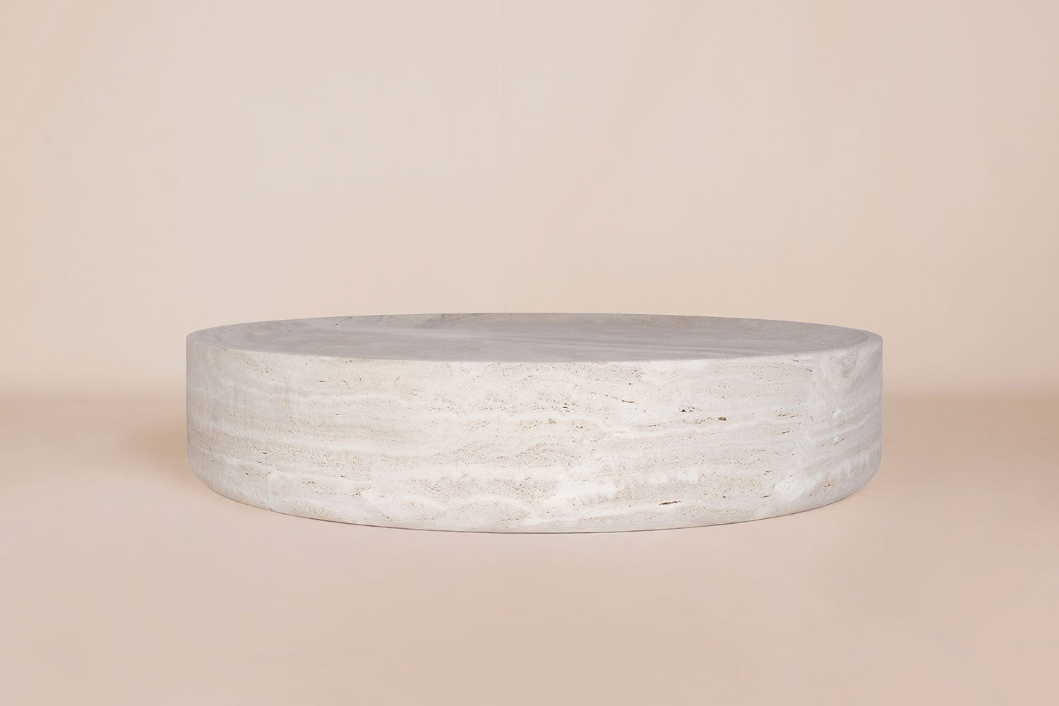 Vicenza round travertine coffee table sculptural natural stone design Eden Stone Designs